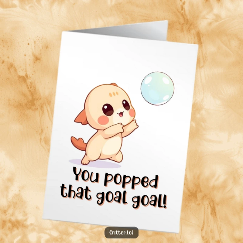 Funny free printable congratulations card showing a playful creature character attempting to catch a floating bubble, symbolizing success.