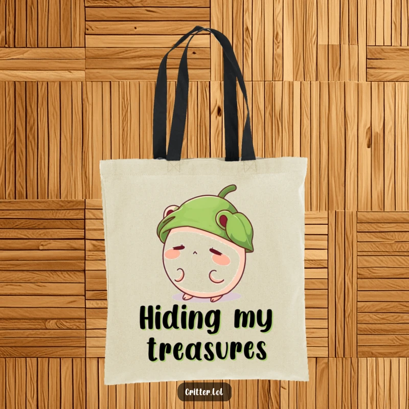Funny tote bag with a shy, round critter wearing a leaf hat peeking out, perfect for cute and practical use.